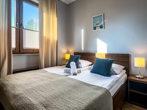 Posteľ alebo postele v izbe v ubytovaní Villa 4 Pory Roku