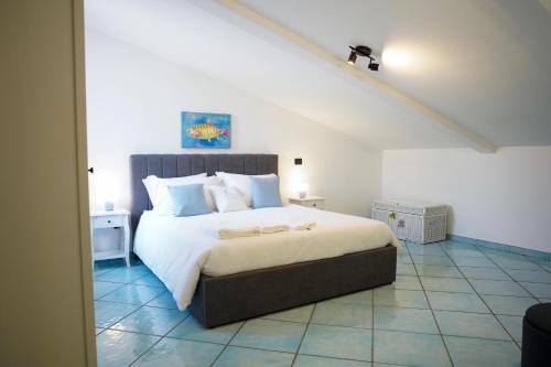 Postel nebo postele na pokoji v ubytování il cielo in una stanza