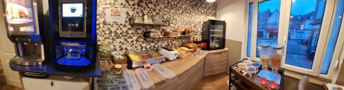 Nápoje v ubytování hôtel- restaurant le Saint Quentin