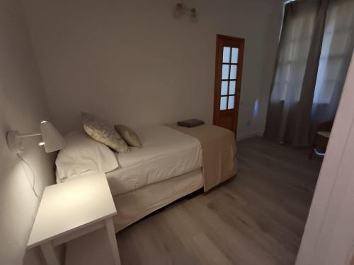 Ένα ή περισσότερα κρεβάτια σε δωμάτιο στο Esencia lagunera