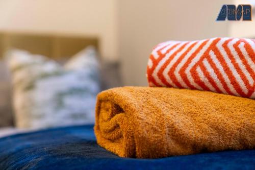 Ένα ή περισσότερα κρεβάτια σε δωμάτιο στο Cosy 2-Bed House I Easy Edinburgh Access I Sleeps 4