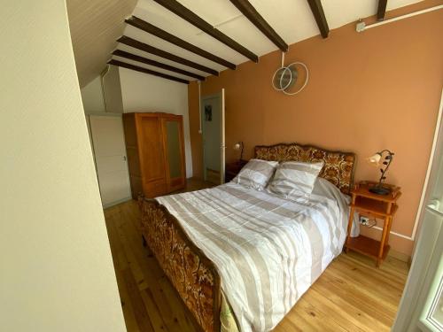 Postel nebo postele na pokoji v ubytování Maison de Montagne Soussens