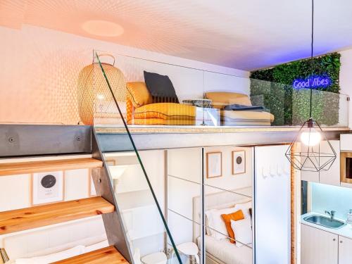 a room with a staircase in a tiny house at House with exclusive terrace in a private condo in Porto