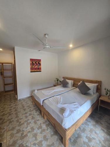 Voodi või voodid majutusasutuse TIKI Beach Club & Resort toas