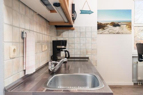 Η κουζίνα ή μικρή κουζίνα στο Ferienwohnung Conrad's Cove