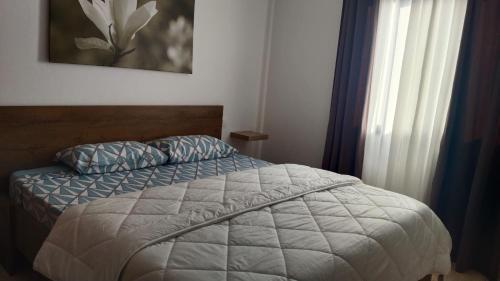 Postel nebo postele na pokoji v ubytování Vista Bayuyo