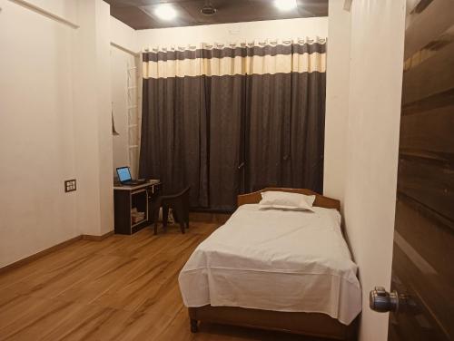 Cama o camas de una habitación en Jay Vijay Home stay