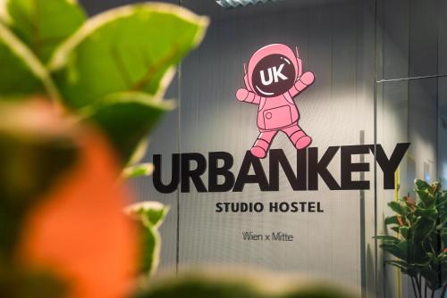 a sign for a uk university studio hospital at UrbanKey Pods - Vienna Neubau in Vienna