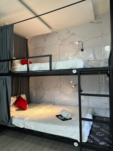 Postel nebo postele na pokoji v ubytování My Suites Da Nang Bed and Bath