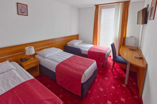 Postel nebo postele na pokoji v ubytování Hotel Creina