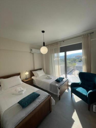 Ένα ή περισσότερα κρεβάτια σε δωμάτιο στο SanGerasimo Villas