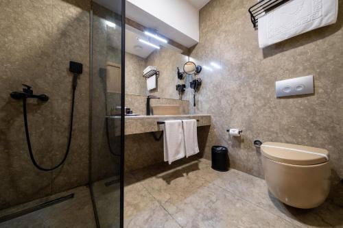 Koupelna v ubytování Avec Hotel