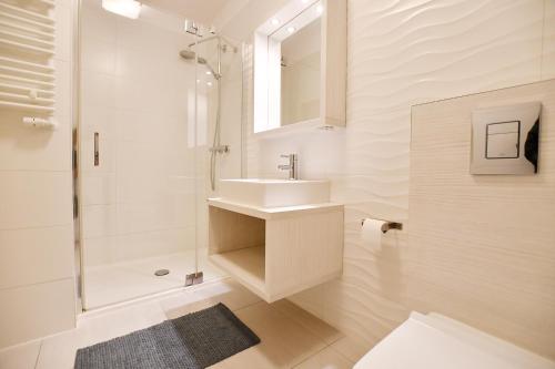 Kúpeľňa v ubytovaní Apartamenty NAVIGATOR-PORT VIEW