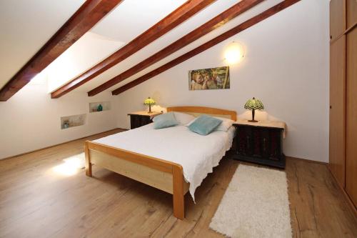 Posteľ alebo postele v izbe v ubytovaní Apartment Fantov Old Town Residence