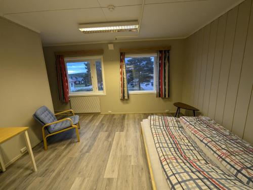 En eller flere senge i et værelse på Givas