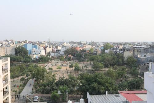 a view of a city from a building at Hotel Elevate Suites Near Delhi Airport WITH- Free Airport PICKUP in New Delhi