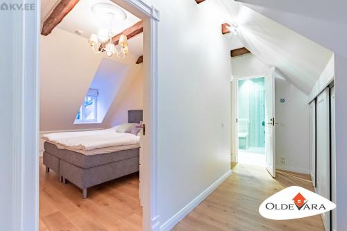 a bedroom with a bed and an attic at Vene 19 Heritage Residence with sauna in Tallinn