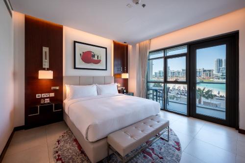 Letto o letti in una camera di The Townhouses The Pearl