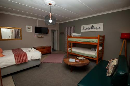 Una cama o camas en una habitación de Le Franz