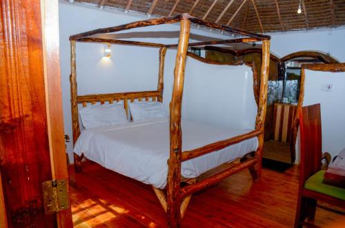Katil atau katil-katil dalam bilik di Hillstone Safari Lodge