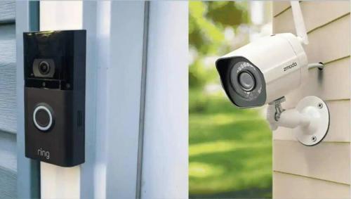 a security camera on the side of a building at Bed En Koffie Oss Stylish Room In Historic Weaving in Oss