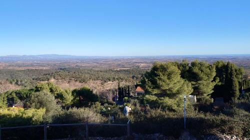 a view from the top of a hill with trees at LOFT L'Olivier in Llauro