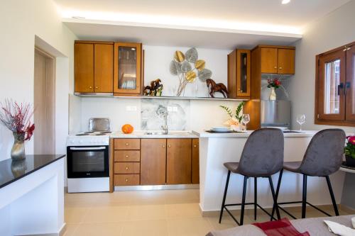 Η κουζίνα ή μικρή κουζίνα στο Veneti Apartments - Corfu Serene Getaways