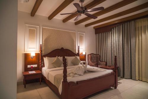 Postel nebo postele na pokoji v ubytování Resort Titli