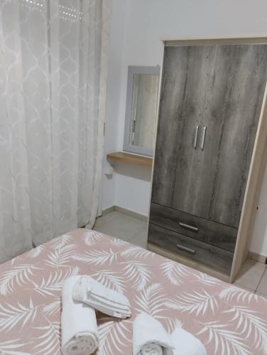 Postel nebo postele na pokoji v ubytování Eirinis home