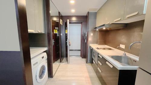 Η κουζίνα ή μικρή κουζίνα στο Nanjing Kaibin Apartment - Kai Run Jin Cheng