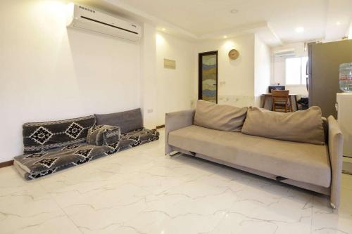 Ruang duduk di Green Meadows Farmhouse