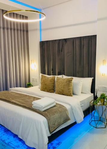 Katil atau katil-katil dalam bilik di Essence Lifestyle Premium