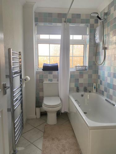 Ένα μπάνιο στο Garden Flat in West Lulworth