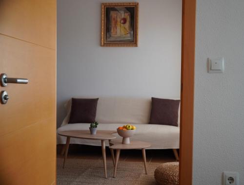 a living room with a couch and a table at Spa and wellness holiday in Villanueva de Río Segura