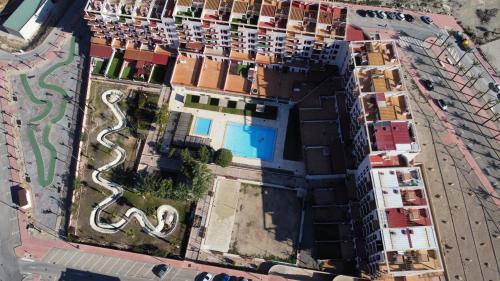 an overhead view of a building with a swimming pool at Spa and wellness holiday in Villanueva de Río Segura