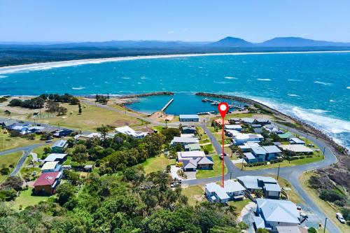 an aerial view of a campground next to the ocean at Salt and Pippies in Harrington