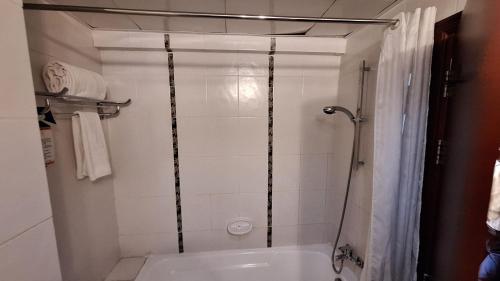 Ein Badezimmer in der Unterkunft Inter Luxury Hotel