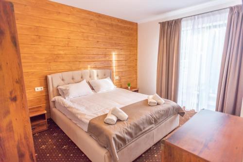 Ένα ή περισσότερα κρεβάτια σε δωμάτιο στο Residence Chalet & Nesh