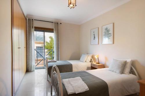 Ένα ή περισσότερα κρεβάτια σε δωμάτιο στο Apart Condomínio do Vale