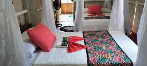 Katil atau katil-katil dalam bilik di Hospedaje Casa Cacicus