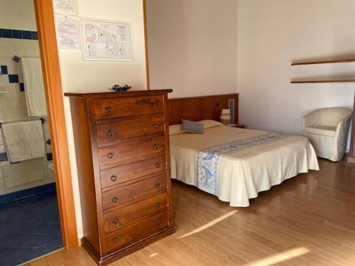 Cama o camas de una habitación en Hotel Villa Canu