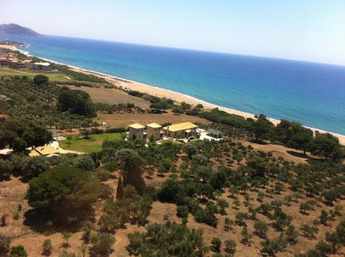 an aerial view of a house next to the beach at Yialenia Estate in Rikia