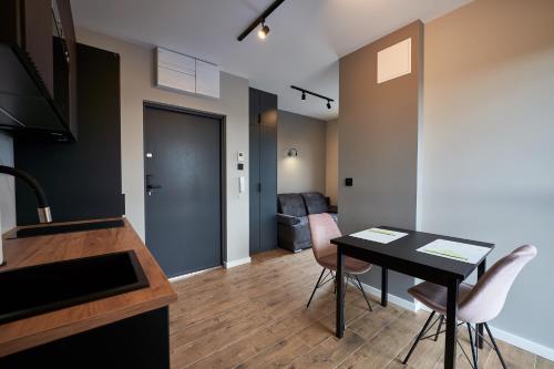 Телевизор и/или развлекательный центр в Apartamenty Panorama