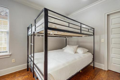 a bedroom with two bunk beds in a room at Miramar Beach Villas #946B in Destin