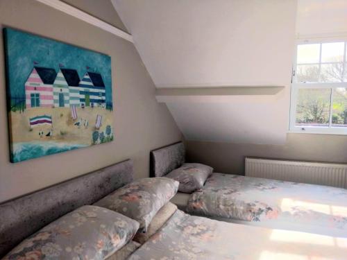 Postel nebo postele na pokoji v ubytování The Countryman Hotel