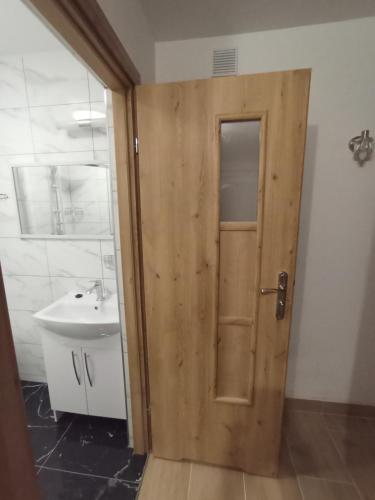 Ένα μπάνιο στο Sea Sun Darłówko Apartaments