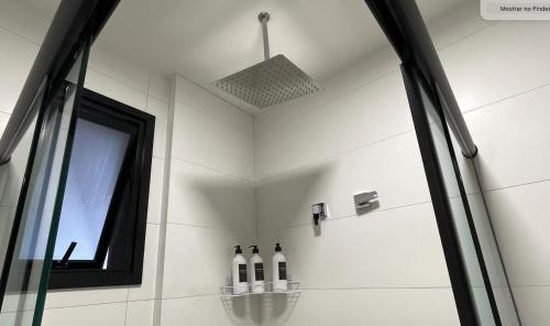 Ένα μπάνιο στο Luxury Collection Jacuzzi e Sala de Cinema