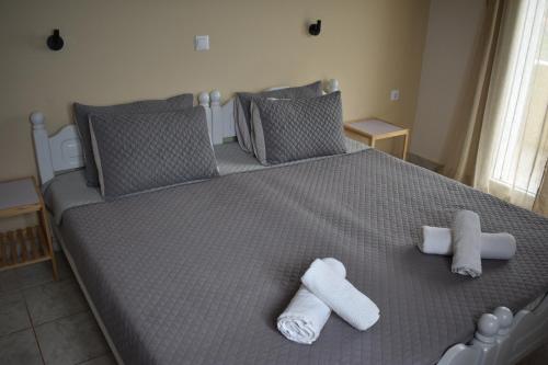 Postel nebo postele na pokoji v ubytování Villa Kostas
