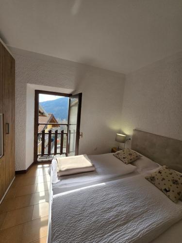 A bed or beds in a room at bb26 apartment mountain Lozio