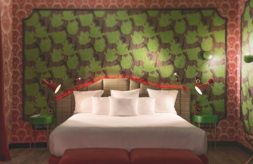 Ένα ή περισσότερα κρεβάτια σε δωμάτιο στο Idol Hotel